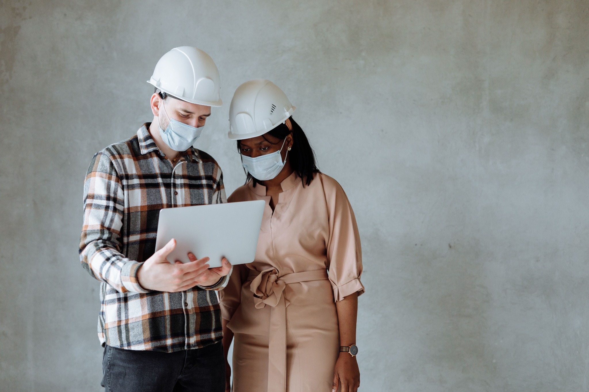 Two professionals reviewing safety information